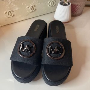 Michael Kors “Sadler” Logo Jacquard Wedge Sandal in Black